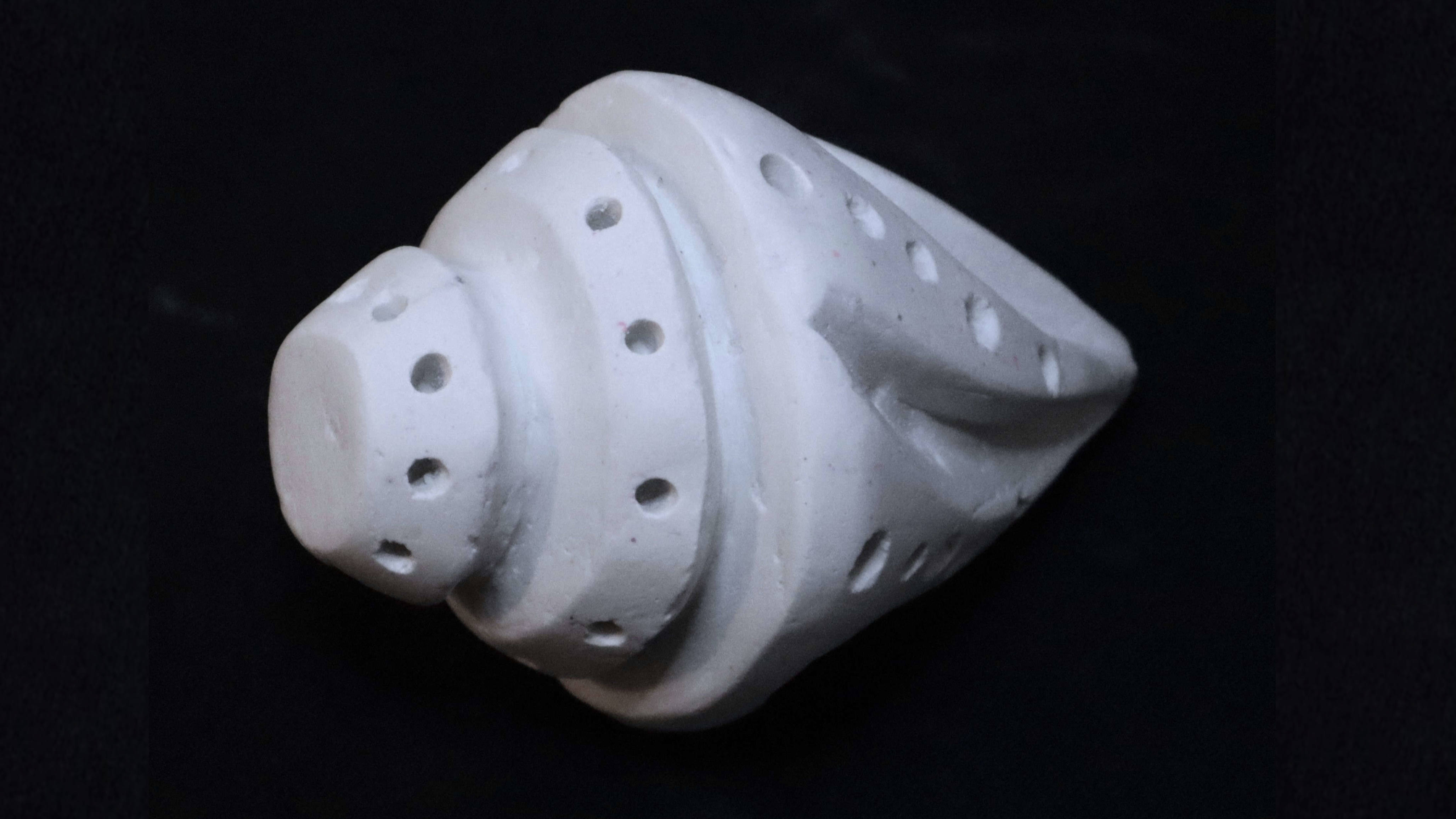Front view of the final abstract seashell sculpture.