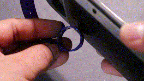 GIF showing testing the NFC ring by bringing closer to a phone whose NFC feature is active making the LEDs light up.