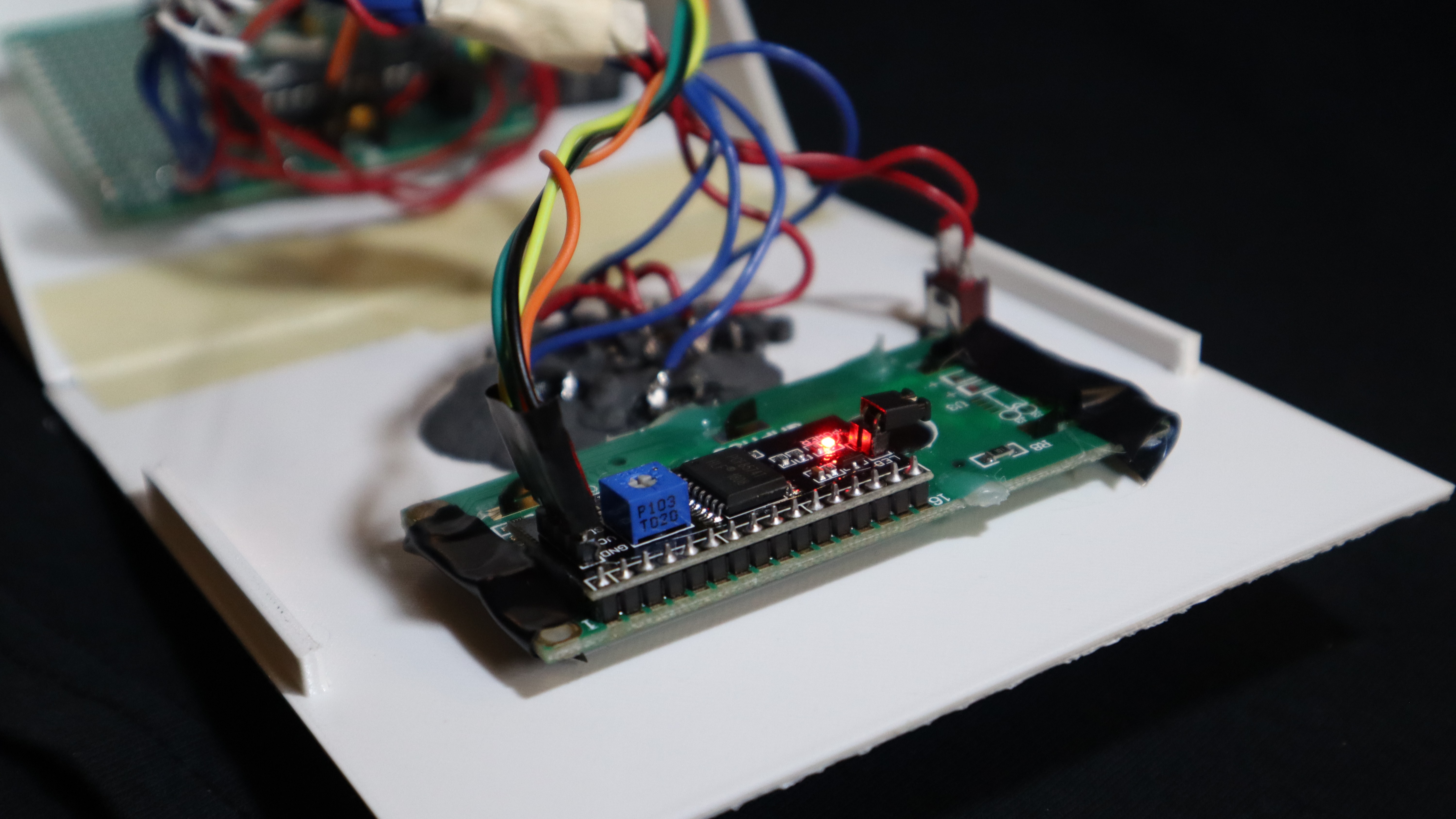 Disassembled enclosure showing the LCD and internal wiring..